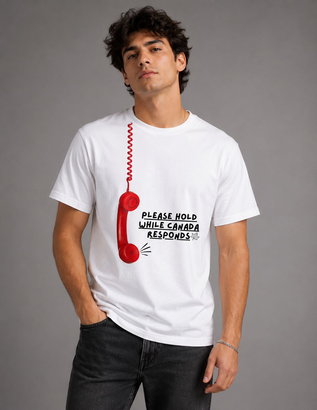 White t-shirt with a retro red phone graphic and 'Please Hold While Canada Responds' text