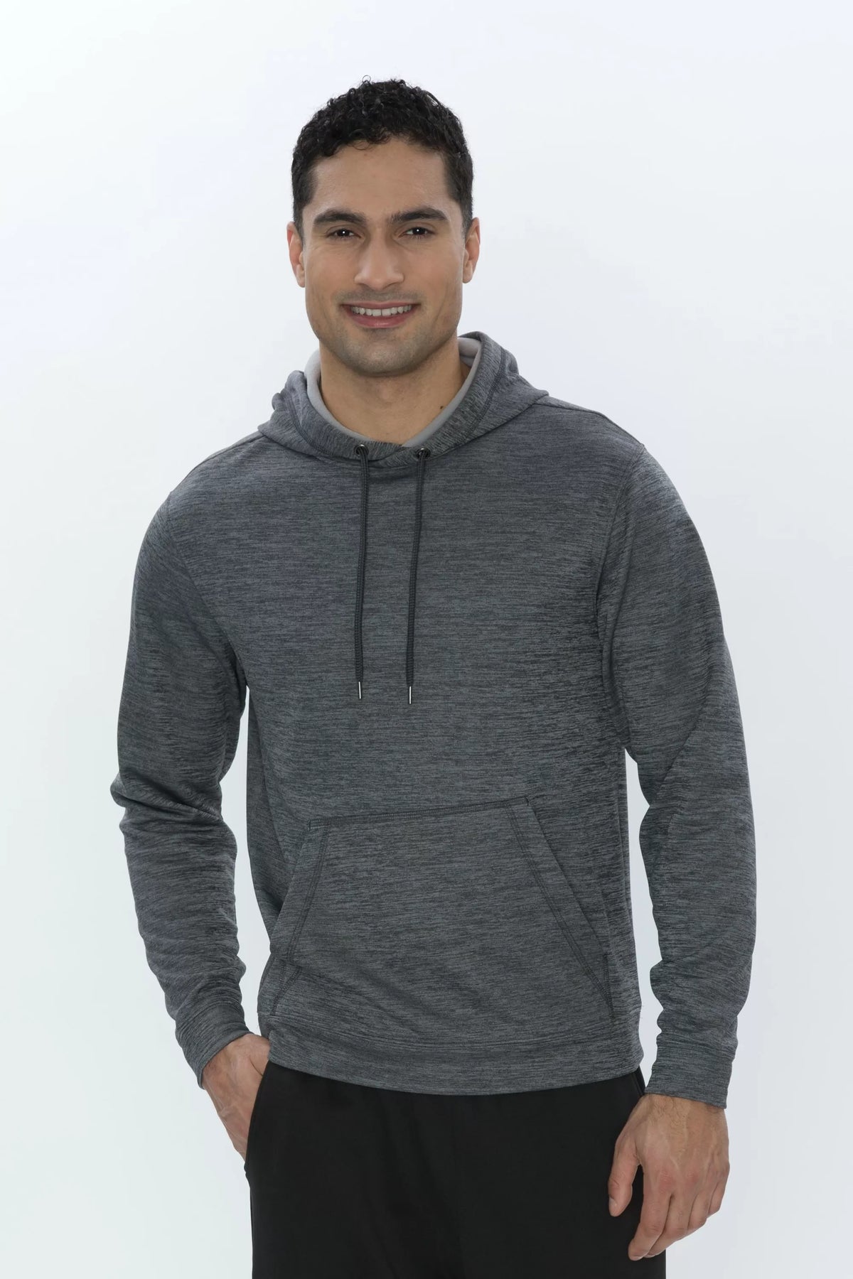Model wearing the ATC Dynamic Heather Fleece Hoodie in Charcoal Dynamic